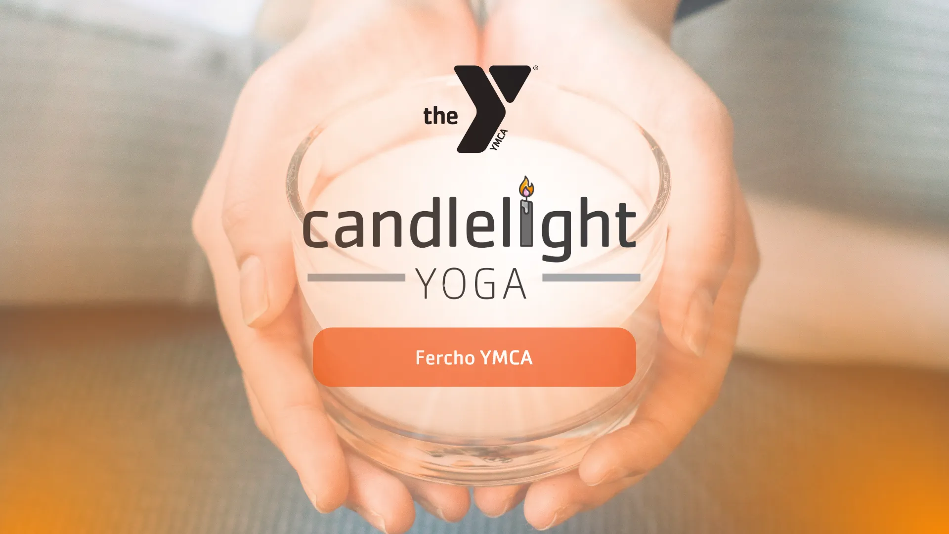 Hand holding a Candle with text reading Candlelight Yoga at Fercho YMCA