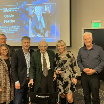 The Fercho Family grouped together with our CEO holding the AFP Award
